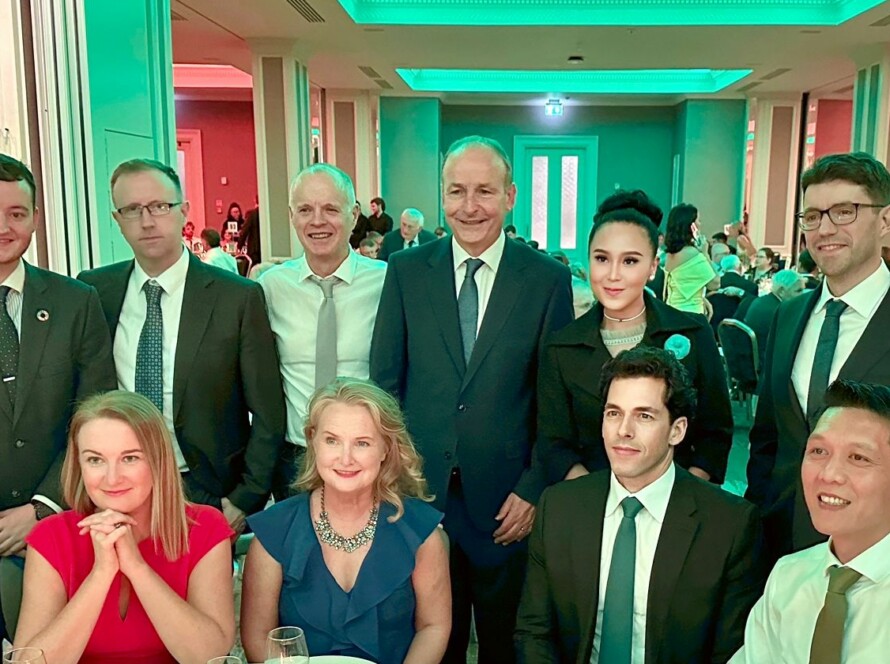 Group dinner featuring Taoiseach Micheál Martin, Senator Mary Fitzpatrick, and a member of the Irish business community, discussing collaborative opportunities for social and economic development.
