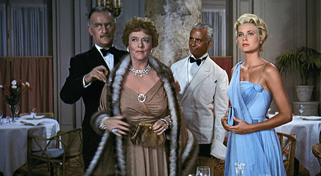 Grace Kelly as Frances Stevens and Jessie Royce Landis as her mother, Jessie, in the opulent Grand Salon of the Carlton Hotel in Cannes, as depicted in Alfred Hitchcock's 1955 film "To Catch a Thief."