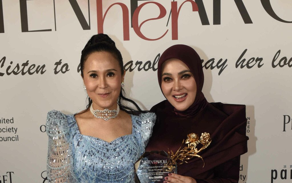 Jessica Chaijaya poses with Syahrini and her Global Cultural Impact Award at the United Society Council's gala in Cannes in 2025