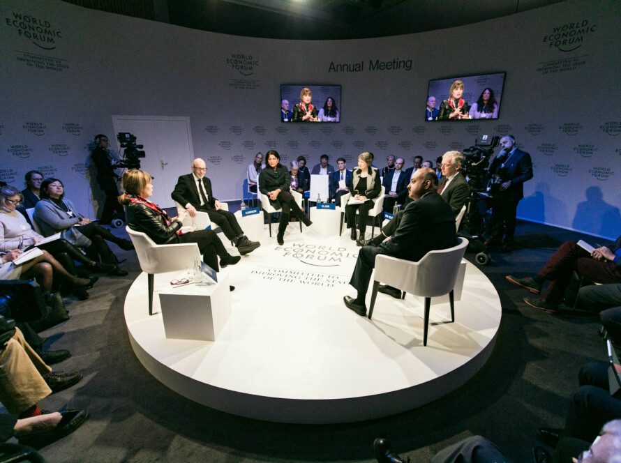 Distinguished thought leaders and policymakers engage in deep discussion at the annual Davos roundtable, focused on creating systemic solutions for global challenges.